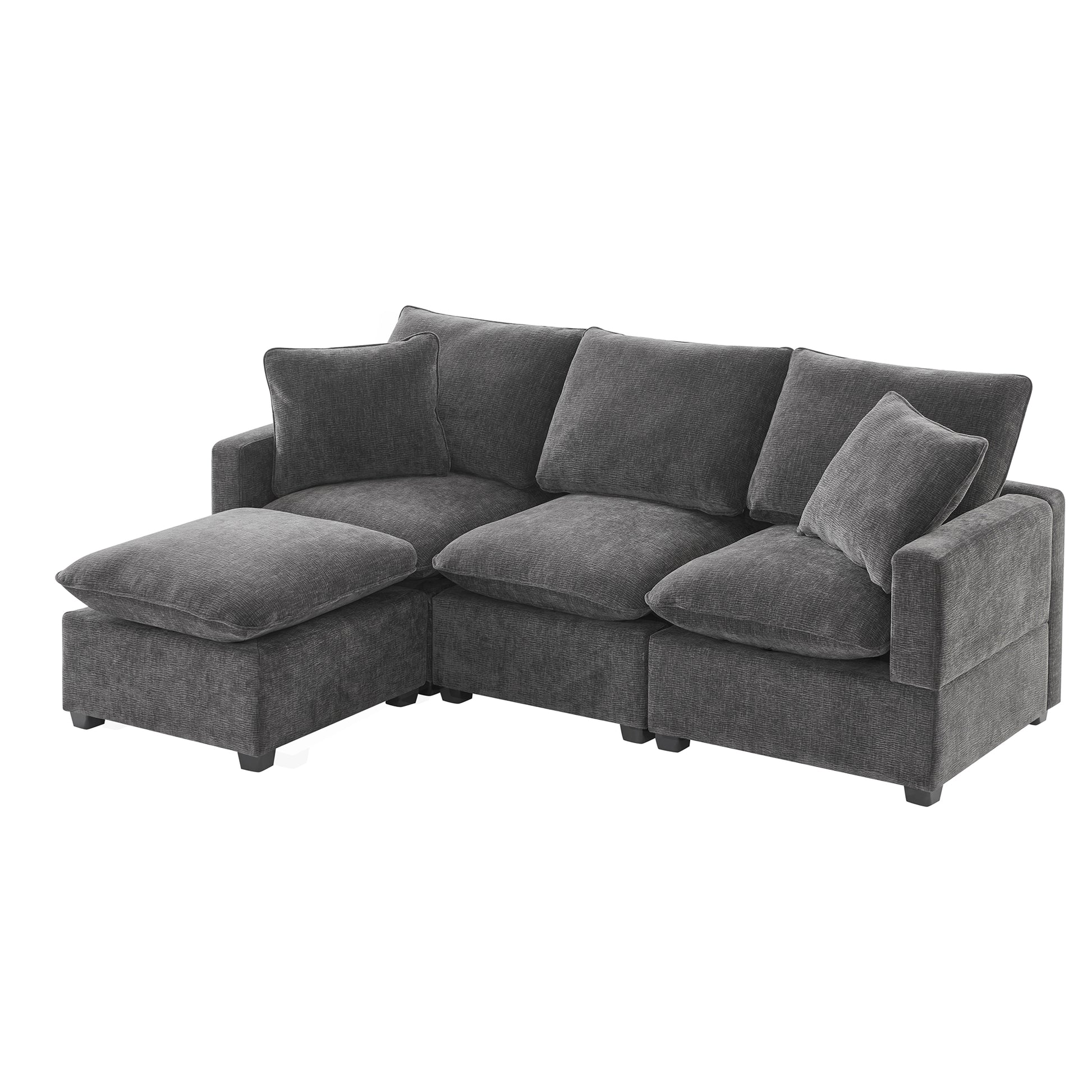 Dark grey upholstered sectional sofa with plush cushions and chaise