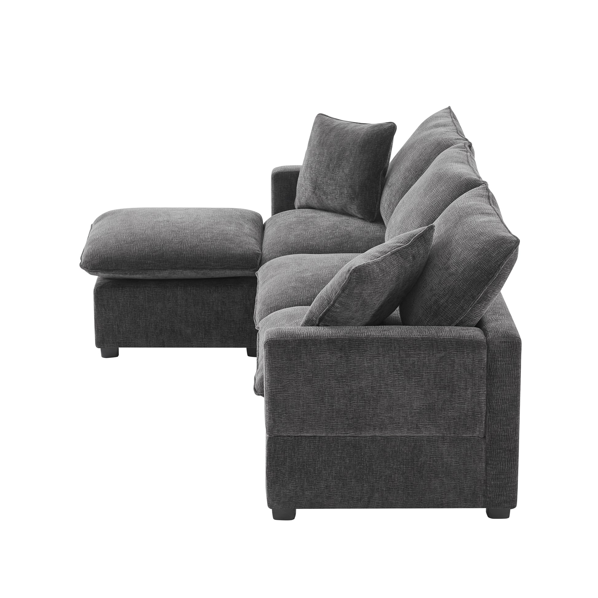 Dark grey fabric sectional sofa with chaise and accent pillows