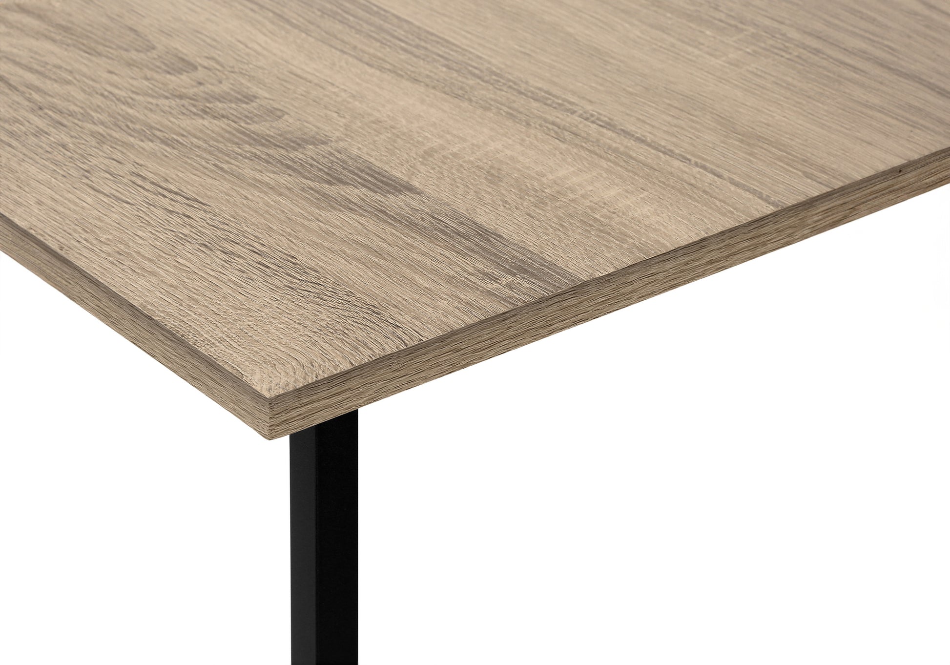 Close up of light oak laminate desktop with black metal leg