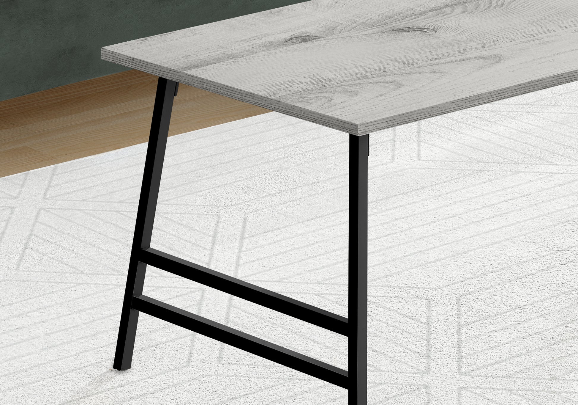Modern grey wood grain desk with black metal legs perfect for home office