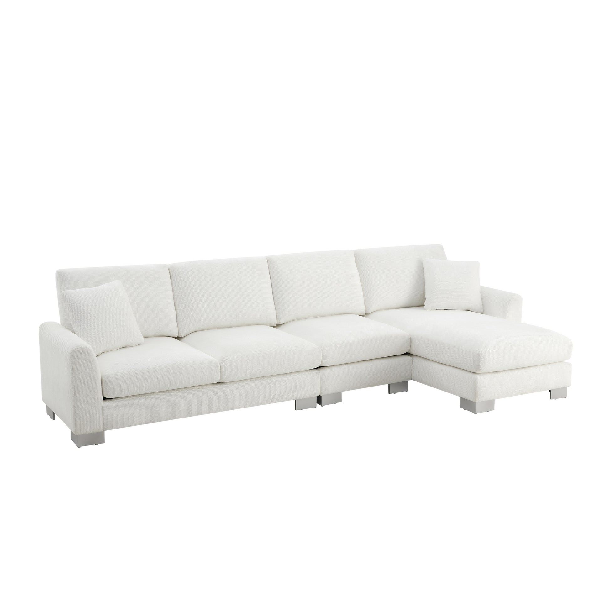 Modern sectional sofa in white textured fabric with chrome legs and accent pillow