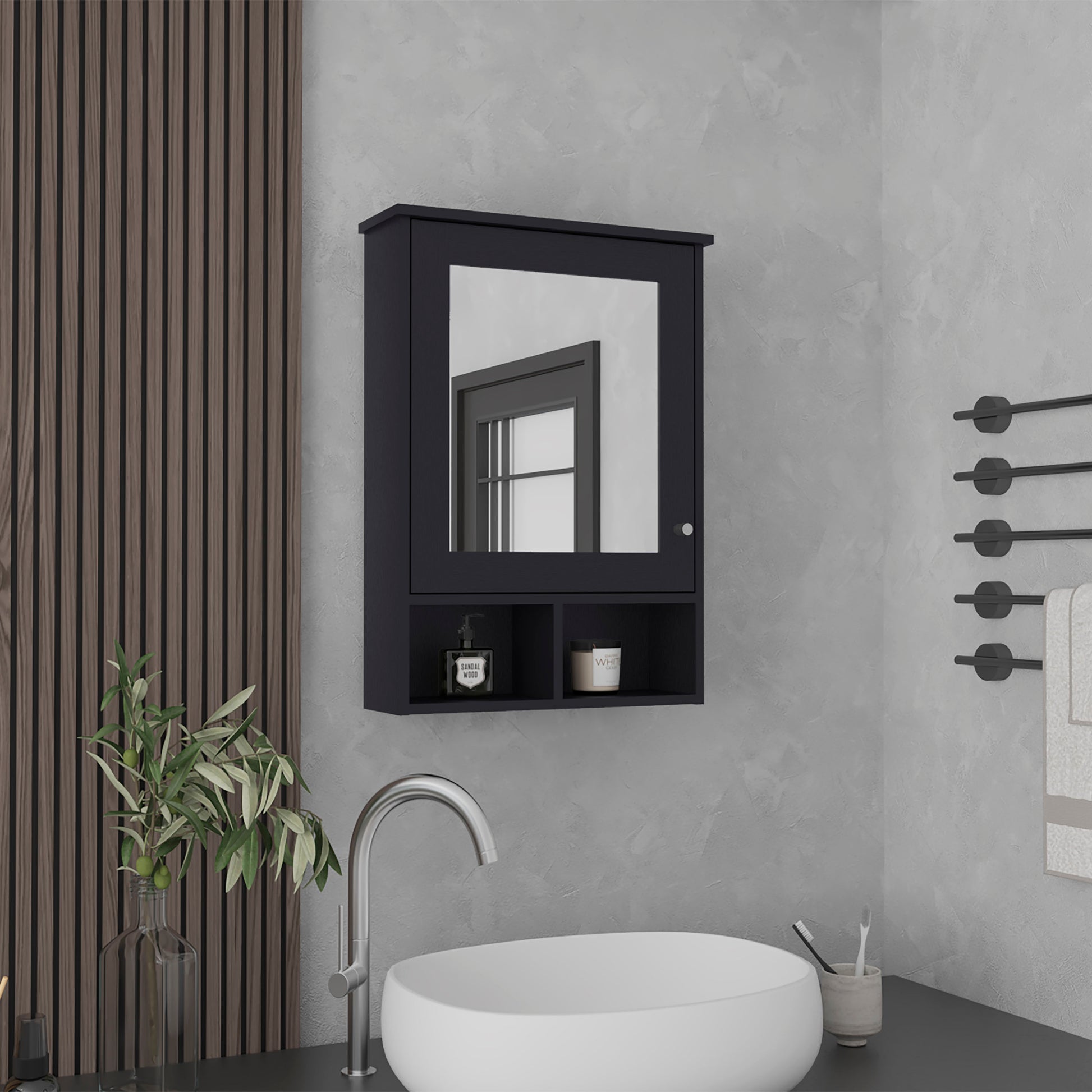 Dark gray medicine cabinet with mirrored door open shelves holding soap and candle