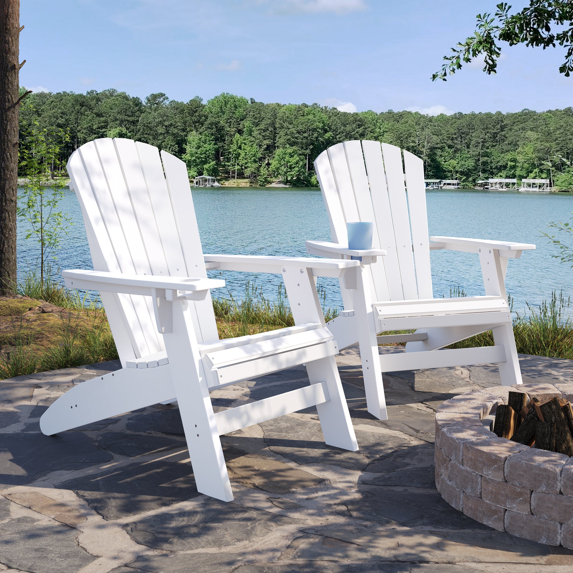 Two white Adirondack chairs by a lake perfect for outdoor relaxation