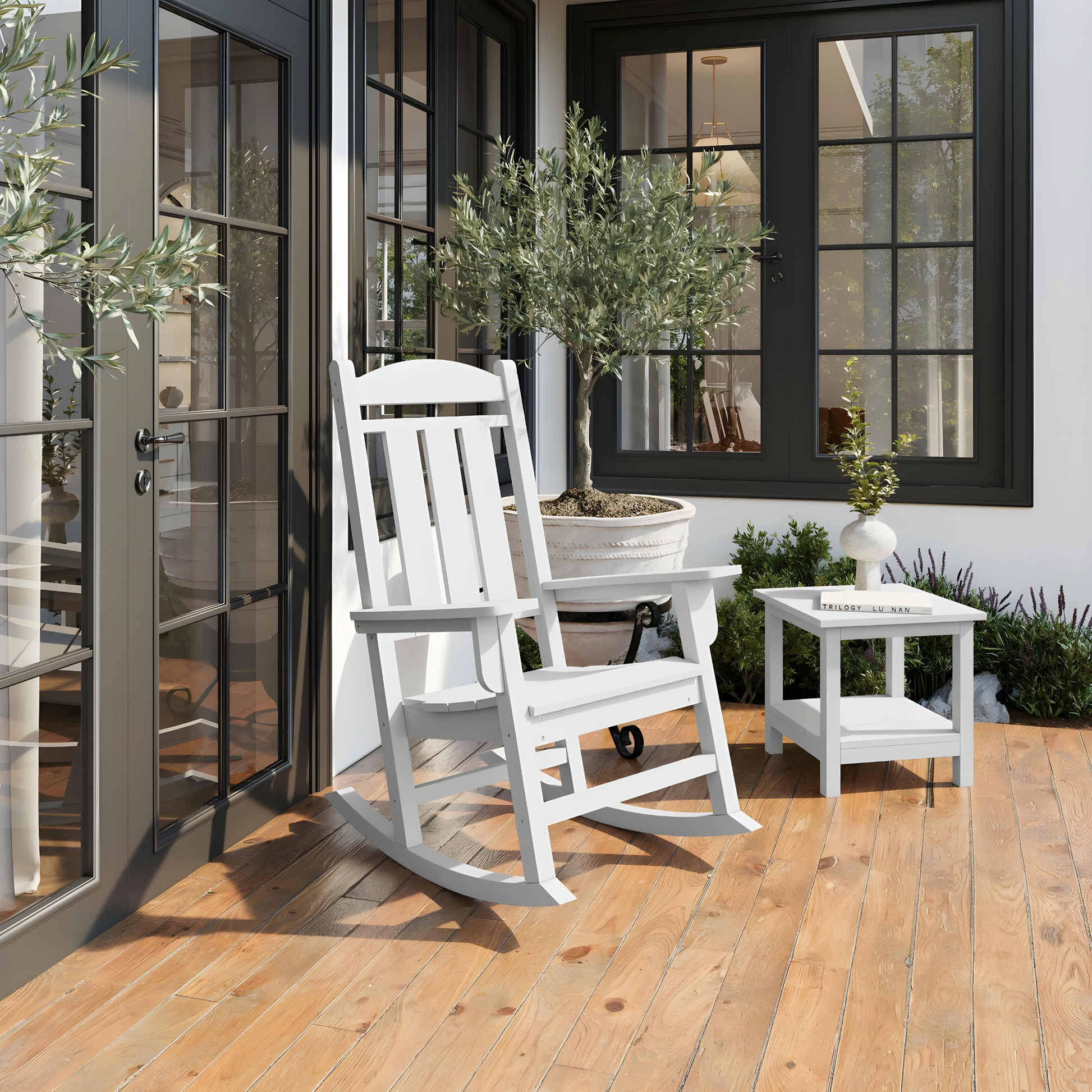 White Adirondack rocking chair made of durable weatherresistant material for outdoor patios