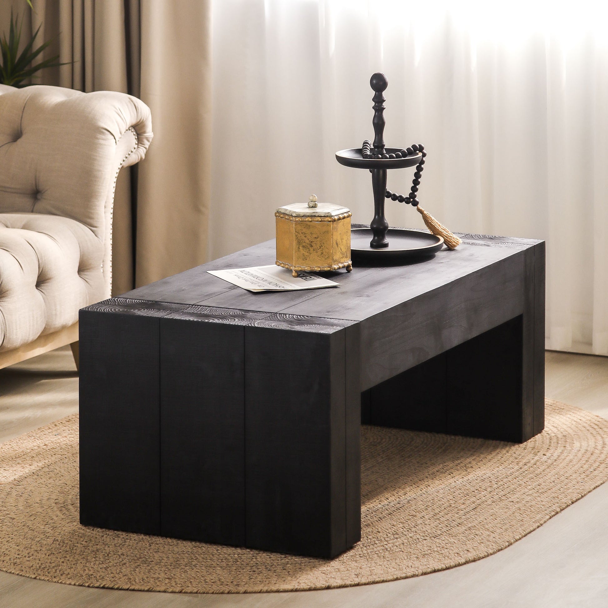 Modern black wood coffee table with textured grain details perfect for living rooms