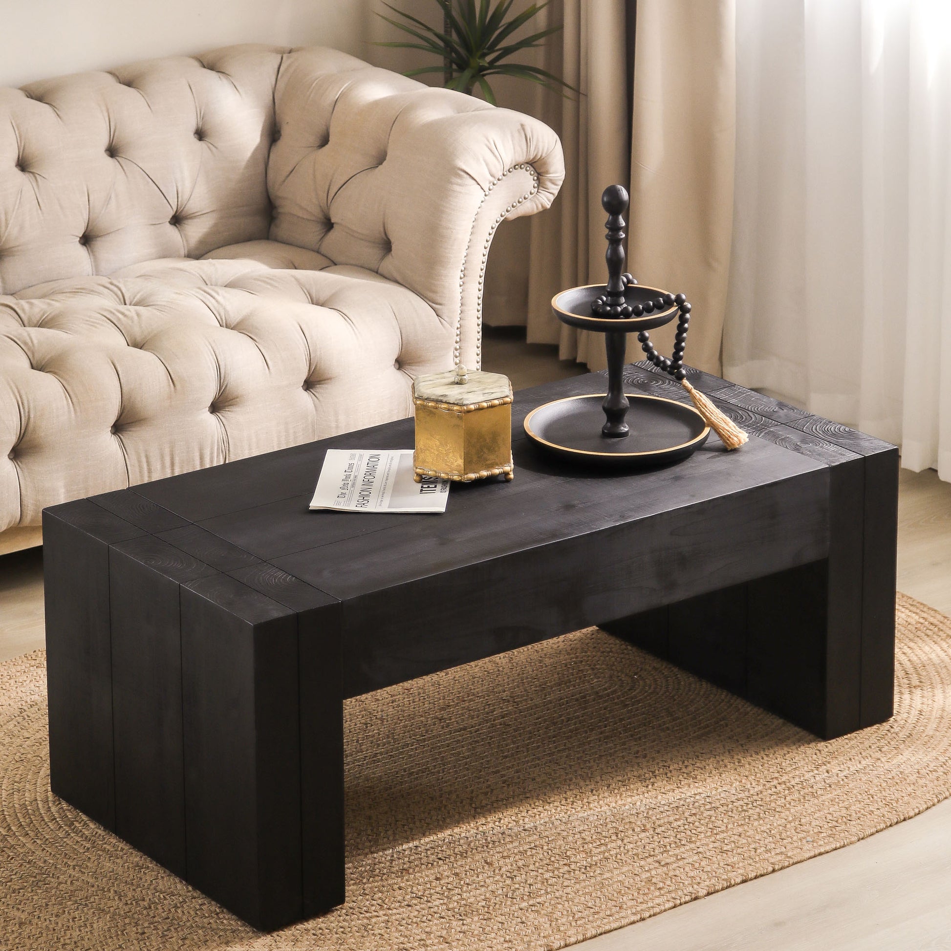 Dark wood block coffee table with textured top ideal for modern living rooms