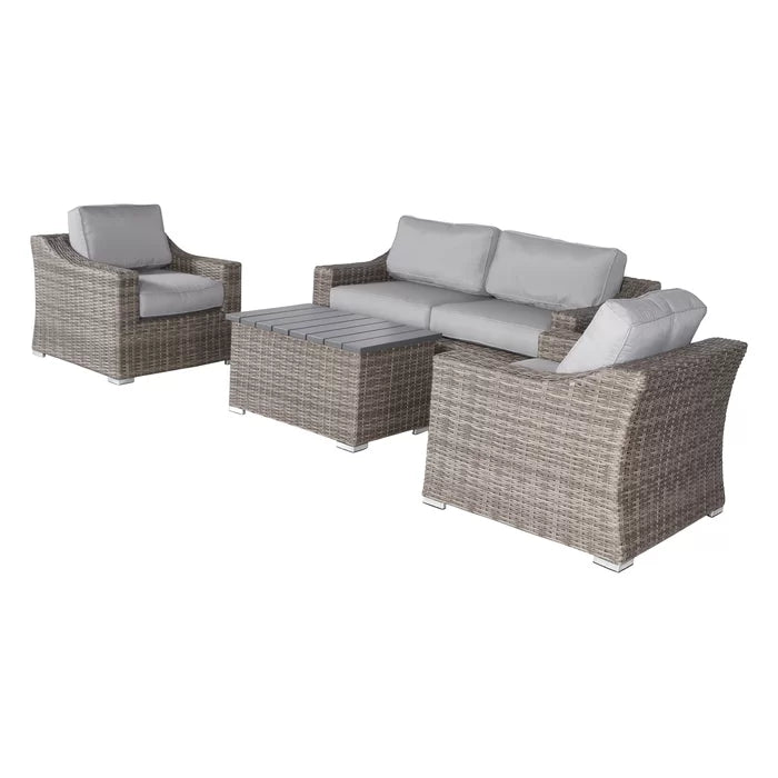 Gray wicker patio sofa set with coffee table and two chairs