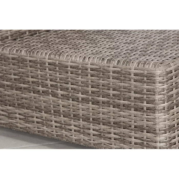 Closeup of grey wicker weave on a modern outdoor sofa section