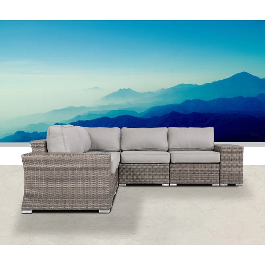 Gray wicker sectional sofa with light gray cushions perfect for outdoor patios