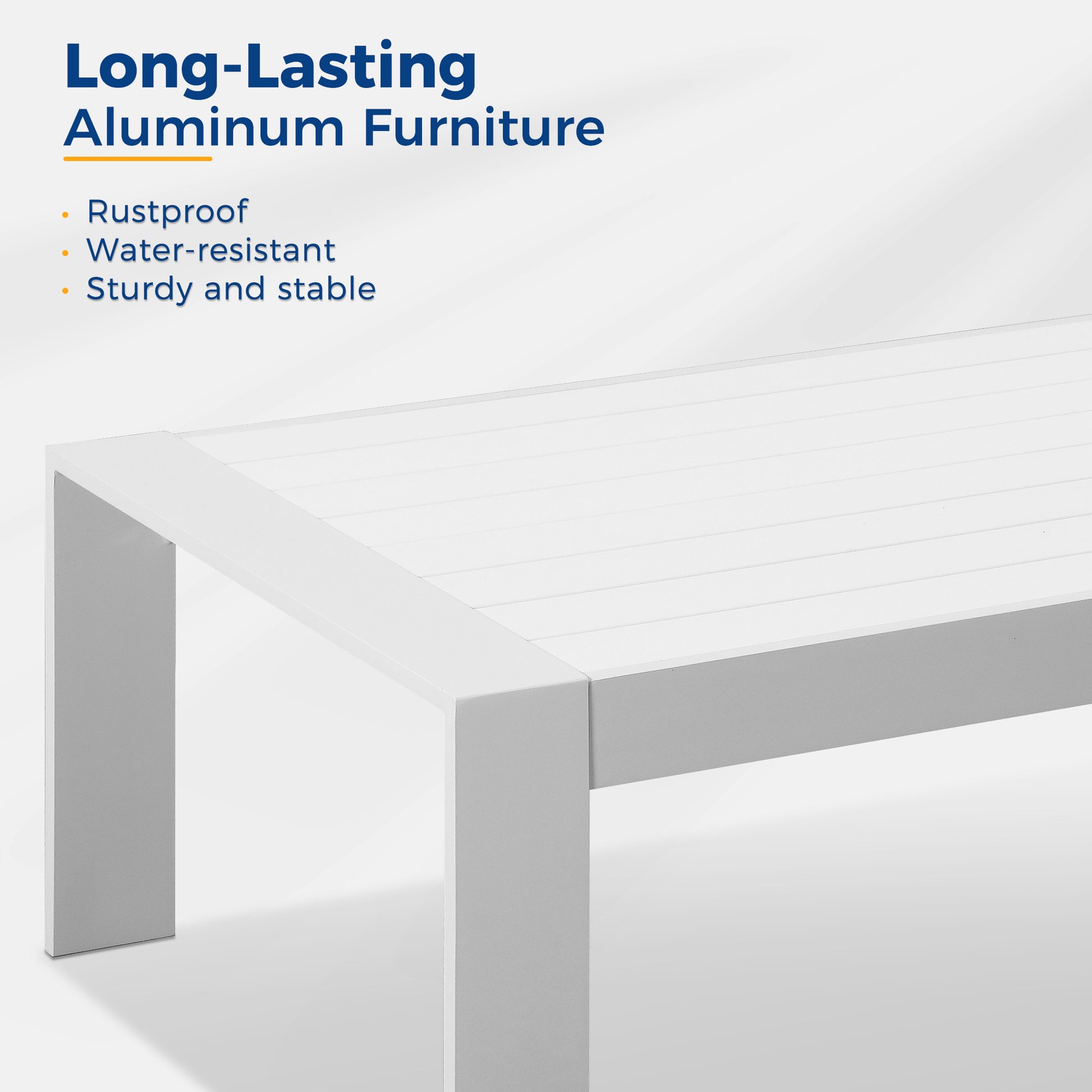 Closeup of a white aluminum coffee table with slatted top and sturdy legs