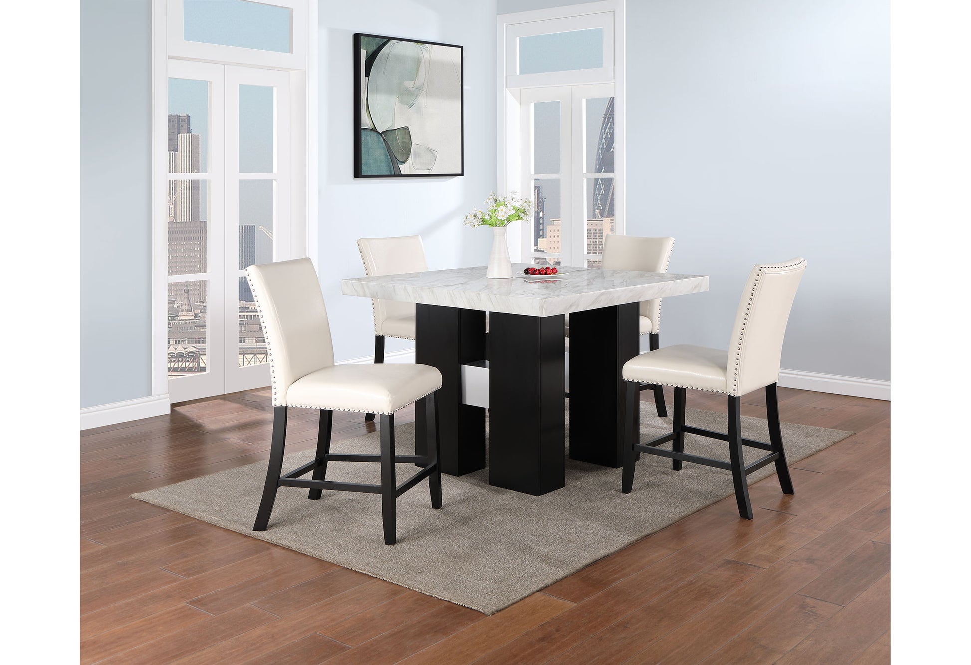 Cream faux leather counter stool with silver nailhead trim and dark wood legs