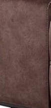Closeup of a plush brown velvet armchair showcasing rich texture and deep color