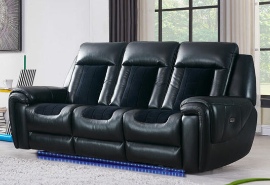 Black leather triple reclining sofa with plush navy blue fabric inserts and blue LED underglow lighting