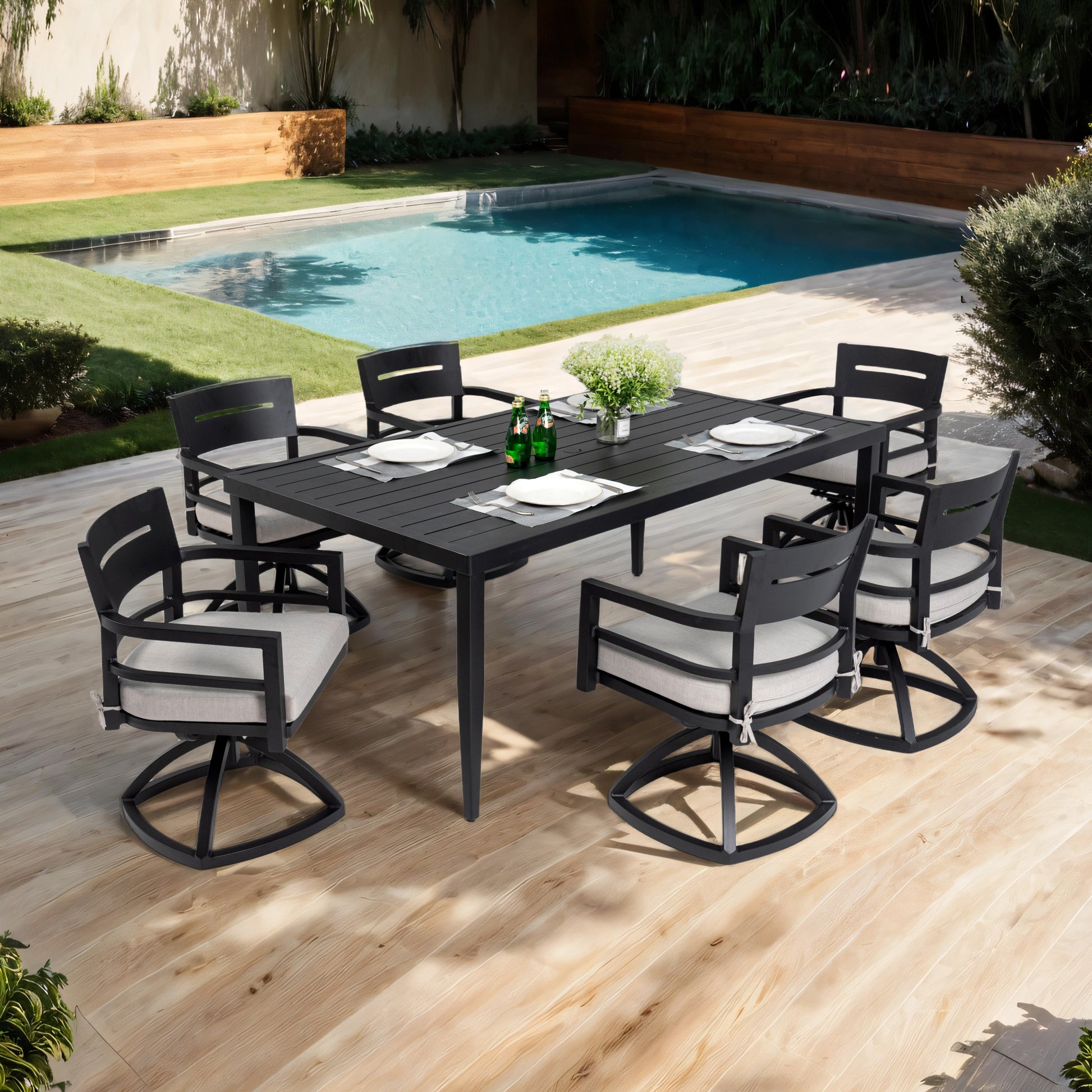 Black aluminum patio dining set with upholstered chairs and slatted table surface