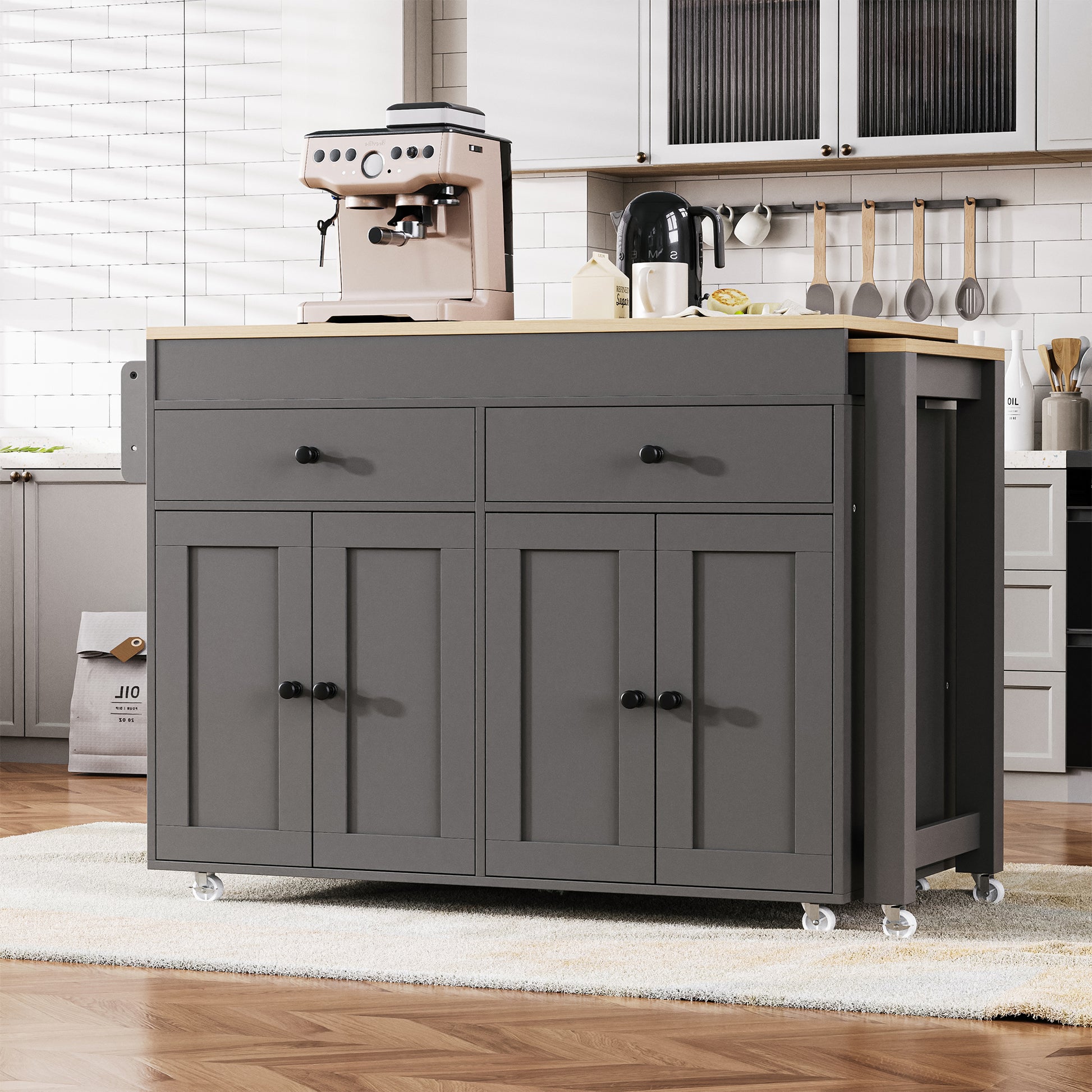 Grey kitchen island cart with butcher block top and storage cabinets for food prep