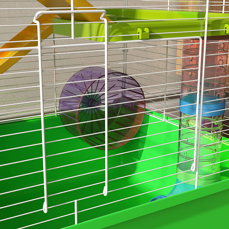 Purple hamster exercise wheel in a green and white cage
