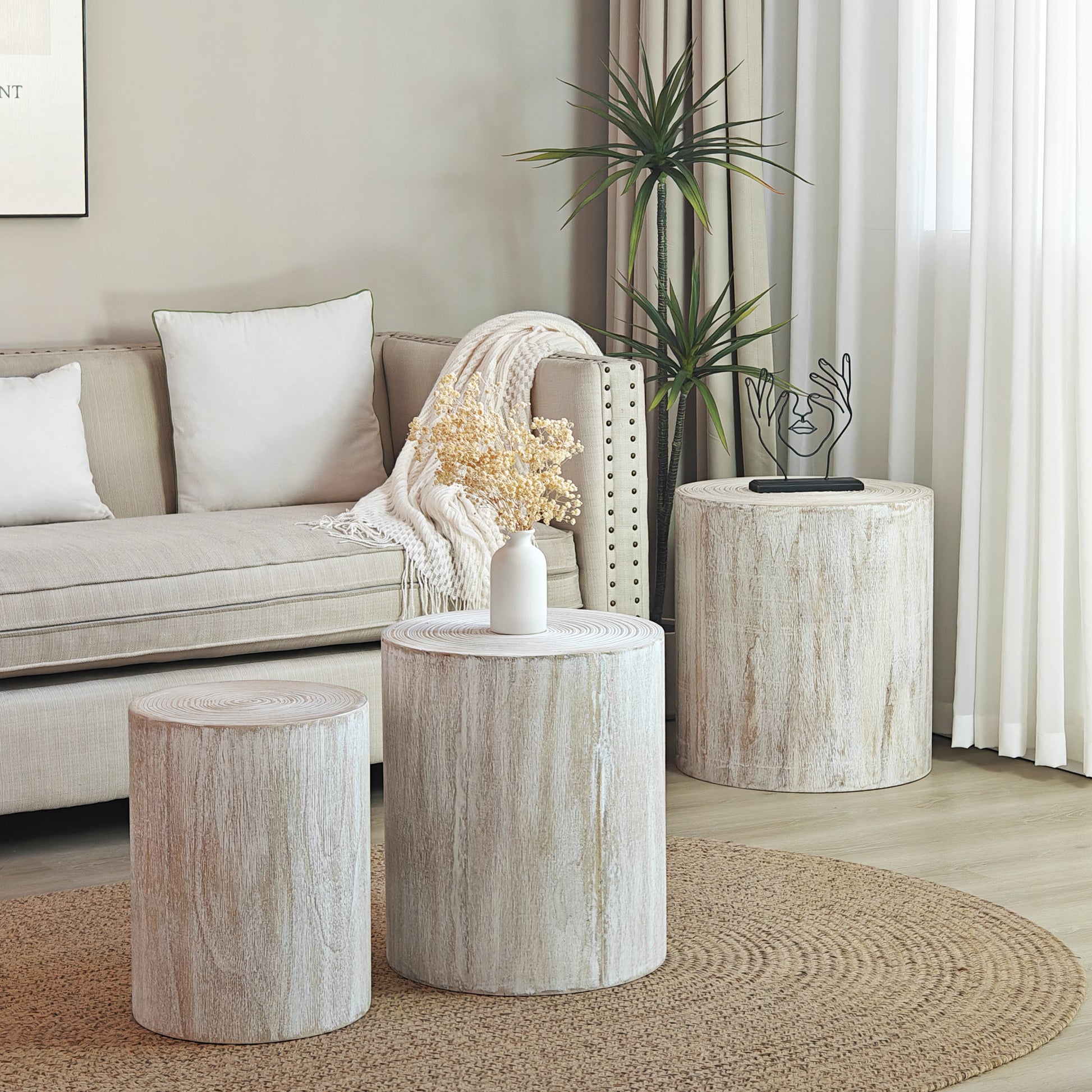 Round whitewashed wood accent table with textured surface for modern living rooms