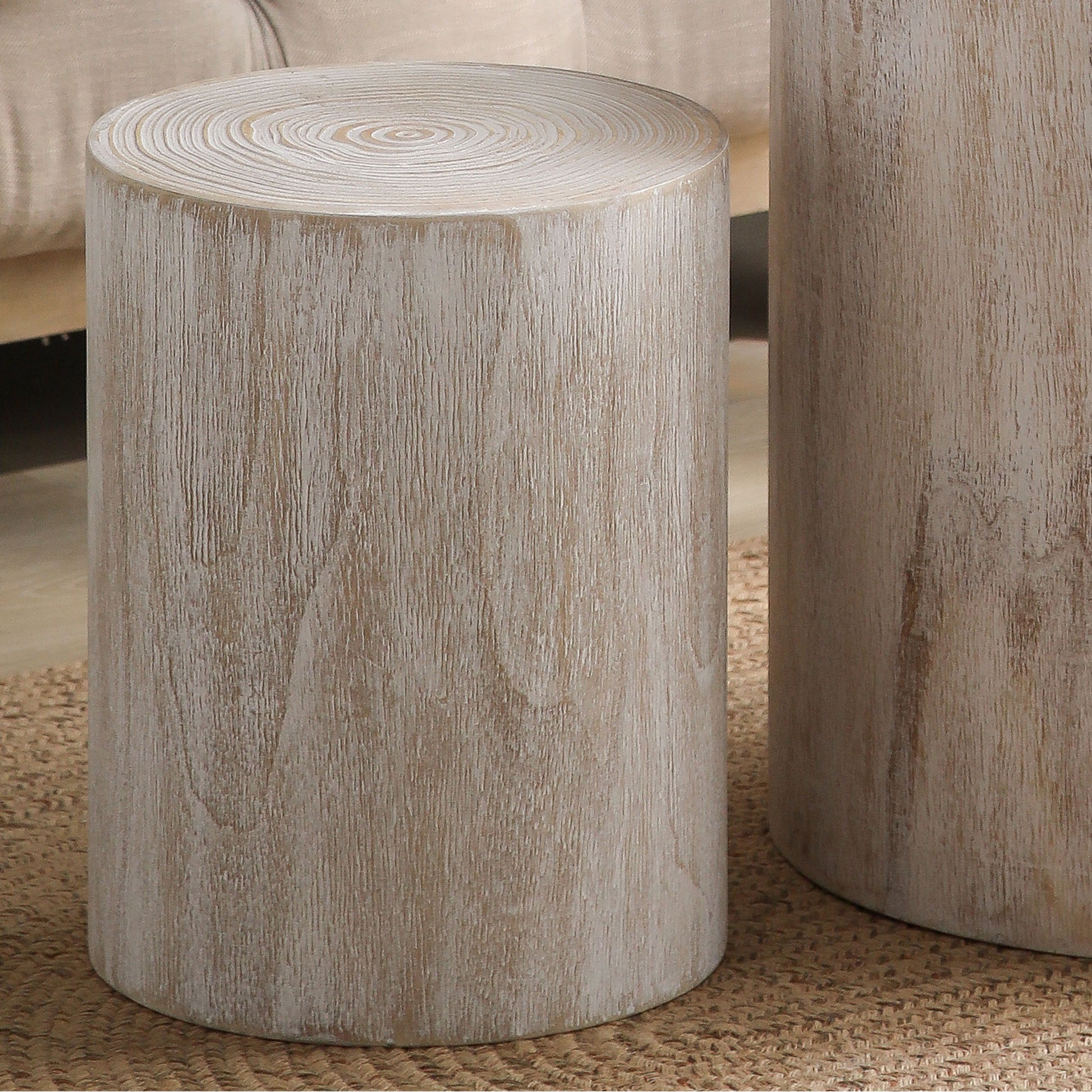 Rustic round wood side table with whitewashed finish