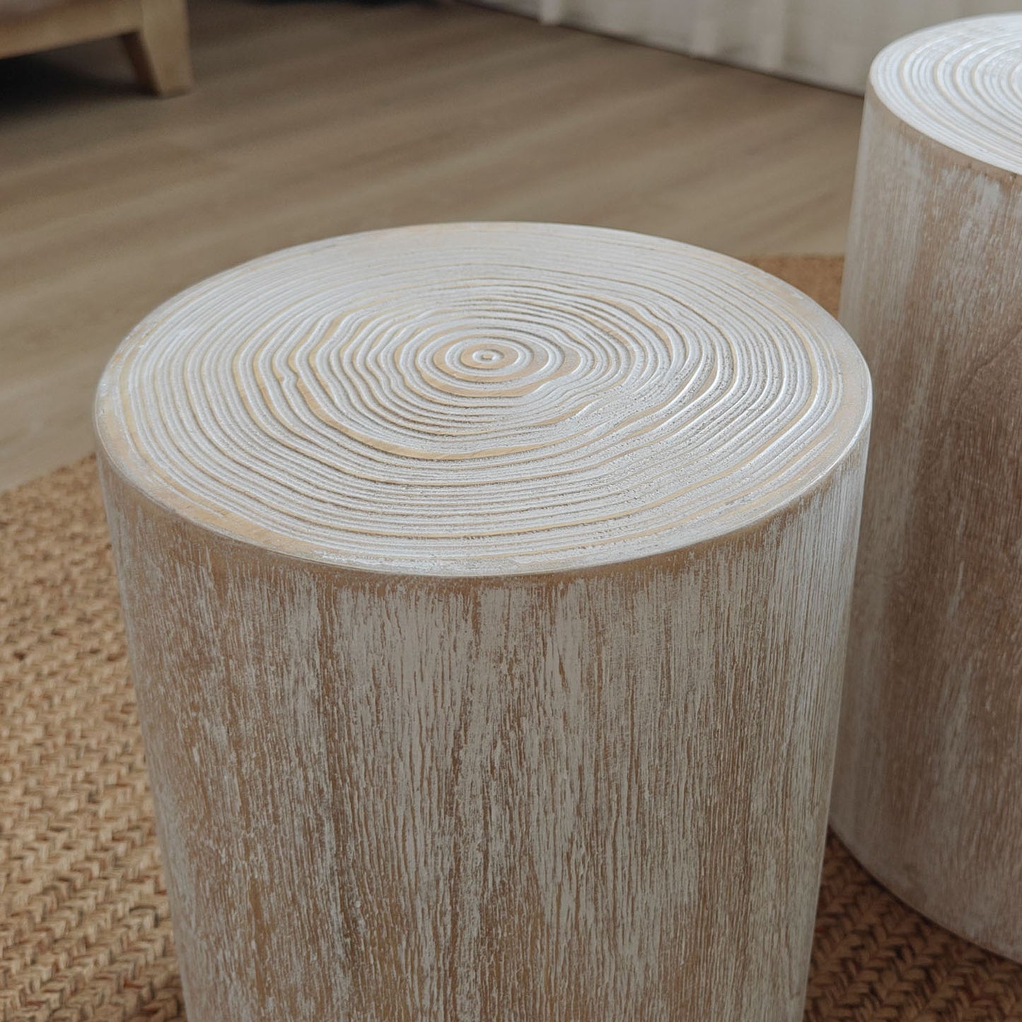 Whitewashed wood slice side table with natural grain texture
