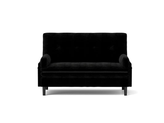 Black corduroy sofa with tufted back and sleek wooden legs perfect for modern living rooms