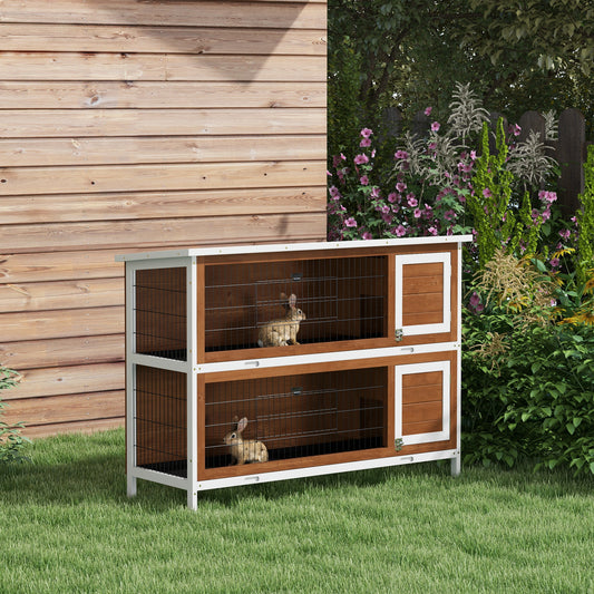 Twotiered wooden rabbit hutch with wire mesh doors and enclosed sleeping areas