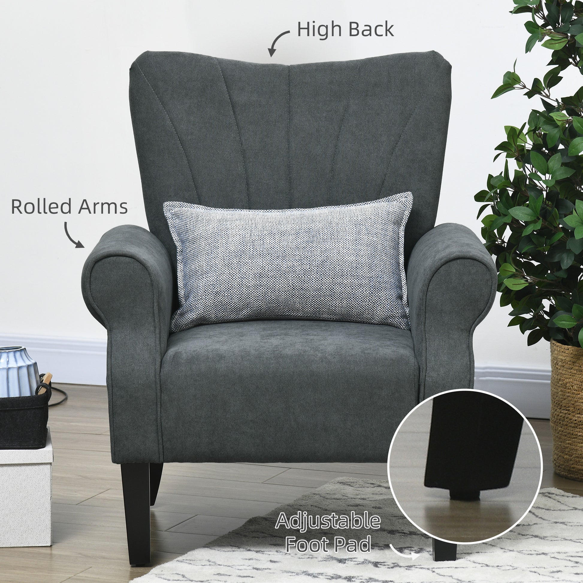 Dark gray upholstered accent chair with rolled arms and high back including decorative pillow