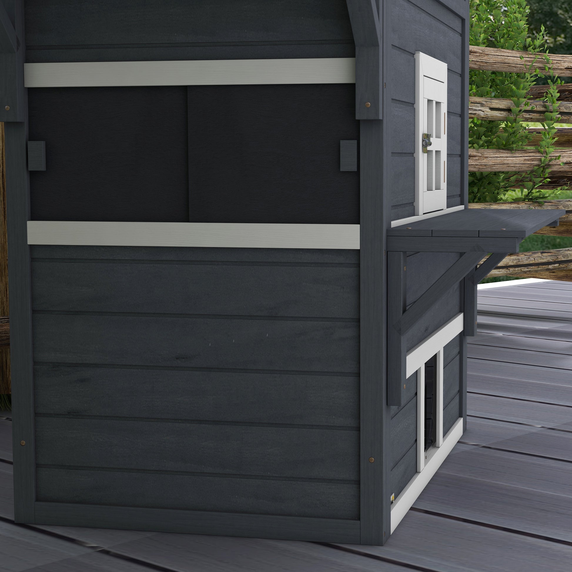 Dark gray wooden dog house with white trim and a hinged door perfect for outdoor pets