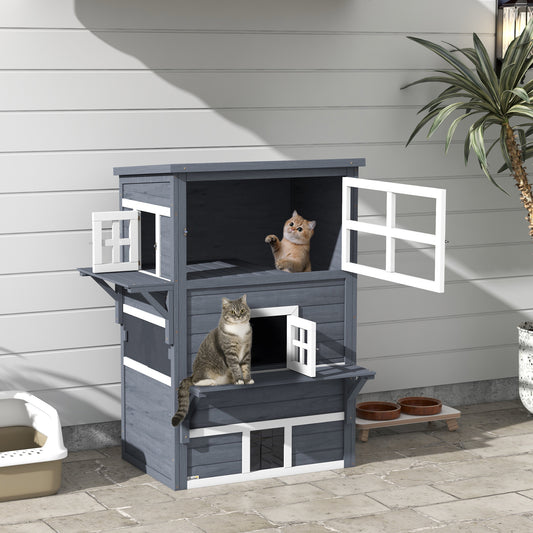 Gray multilevel outdoor cat house with two cats and open windows