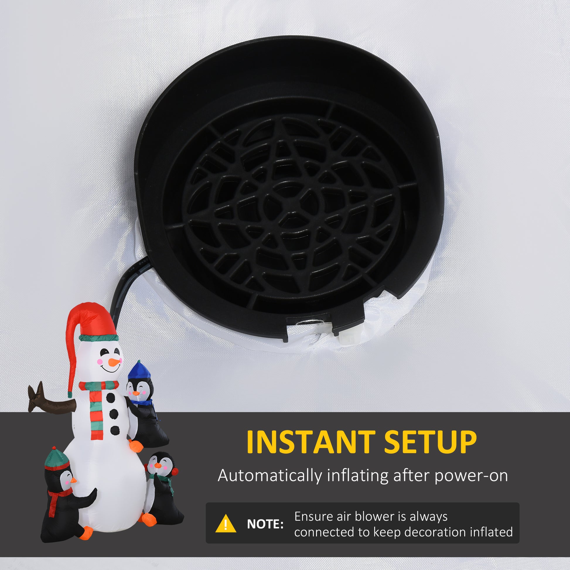 Inflatable snowman with penguins and black blower fan for instant setup