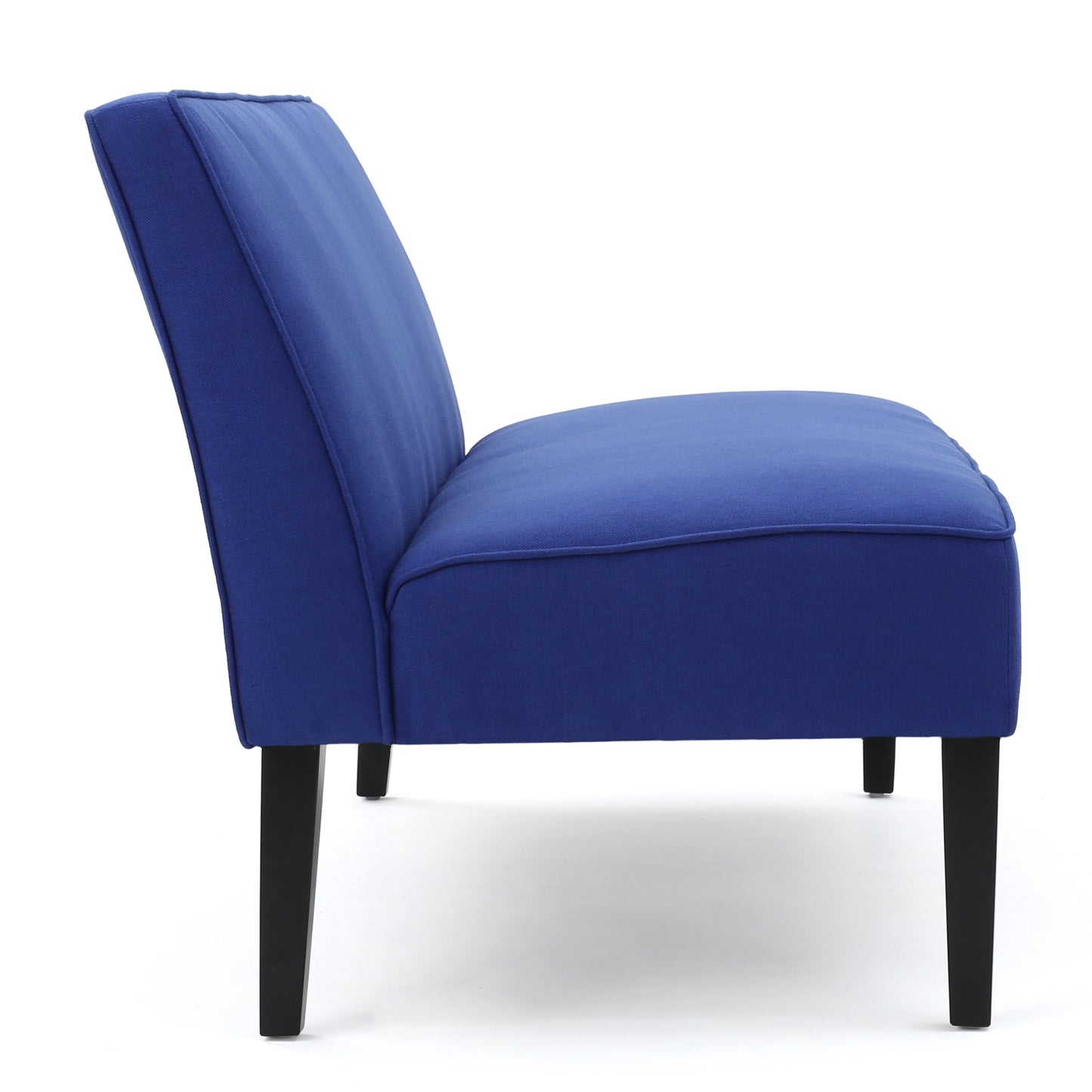 Side profile of a navy blue fabric accent chair with dark wooden legs