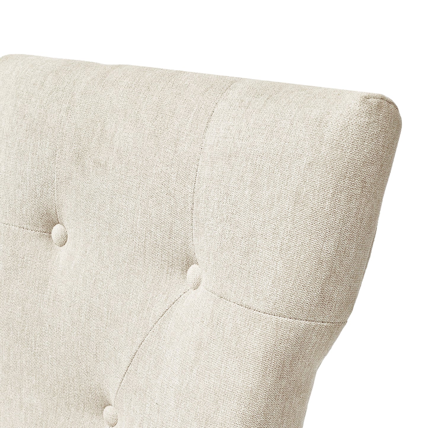 Tufted beige fabric armchair detail showing diamond stitching and button accents for elegant seating