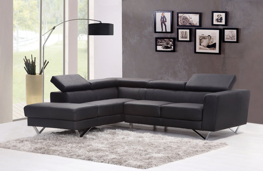 Modern dark grey leather sectional sofa with adjustable headrests and chrome legs