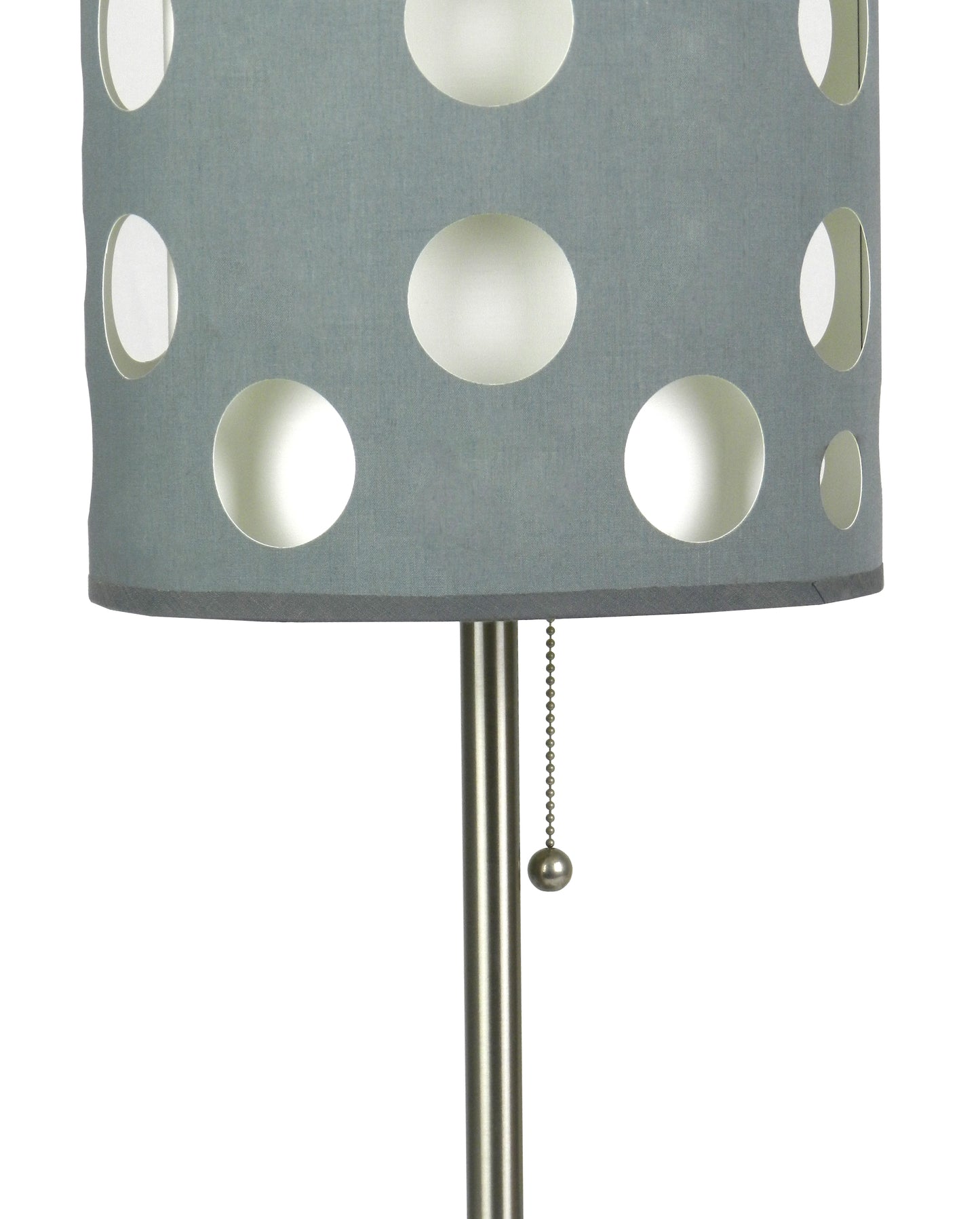 Gray polka dot lampshade with cutout circles ideal for ambient lighting