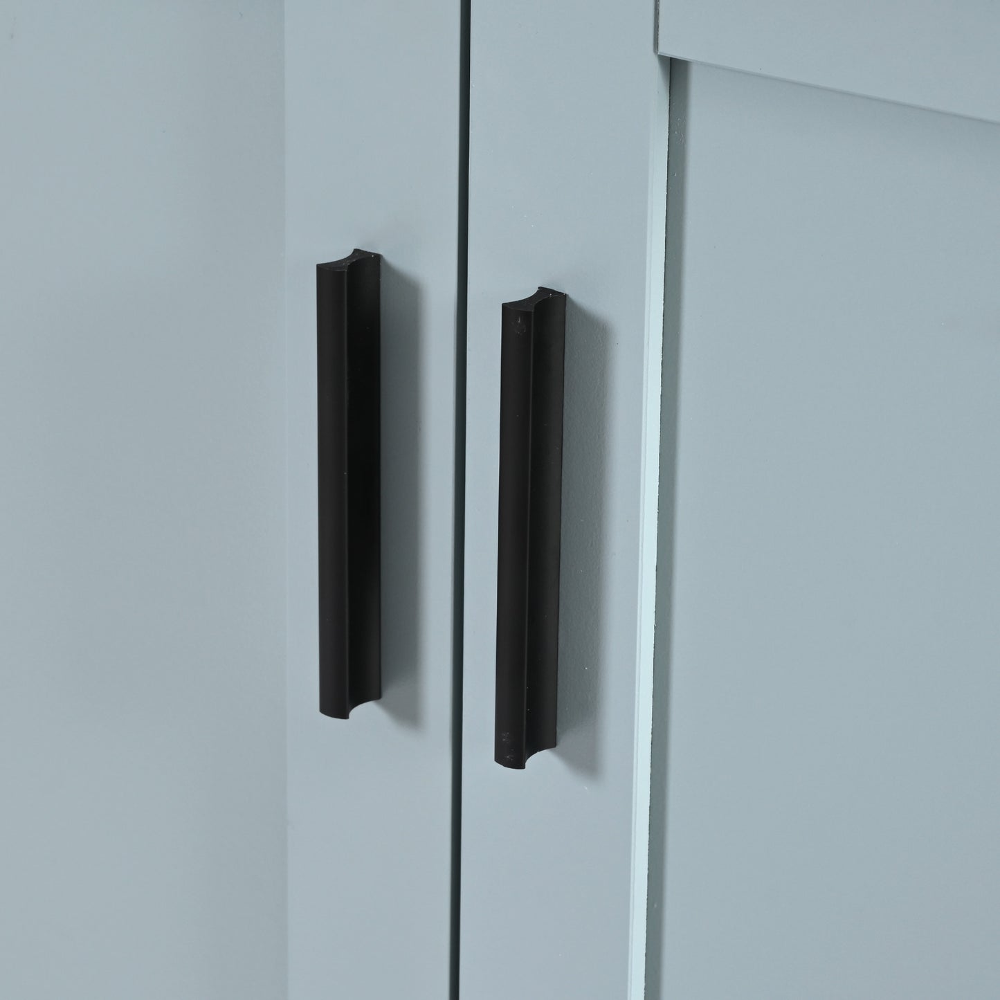 Pair of modern black bar cabinet pulls on light gray doors