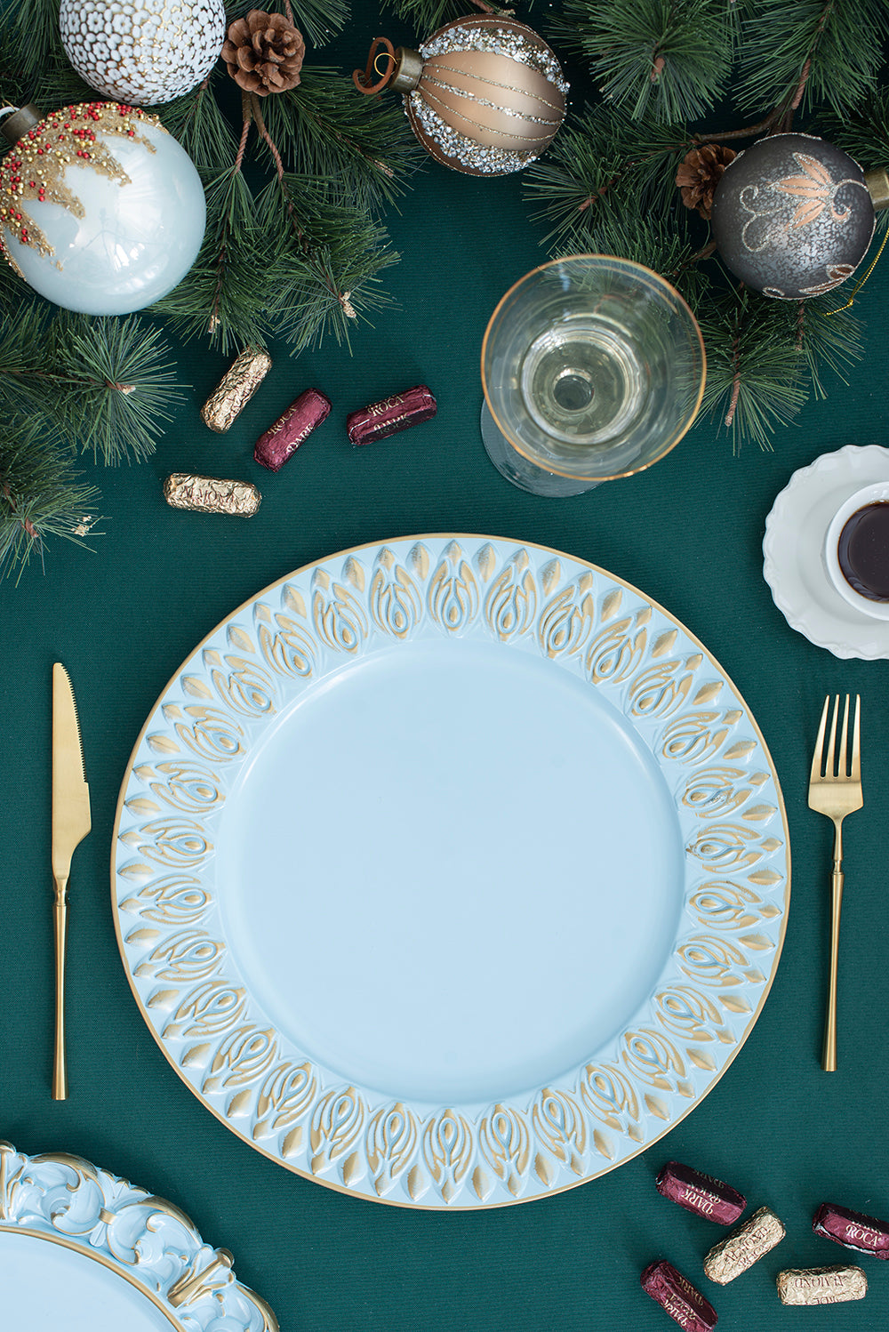 Elegant pale blue dinner plate with embossed gold leaf rim pattern perfect for holiday dining
