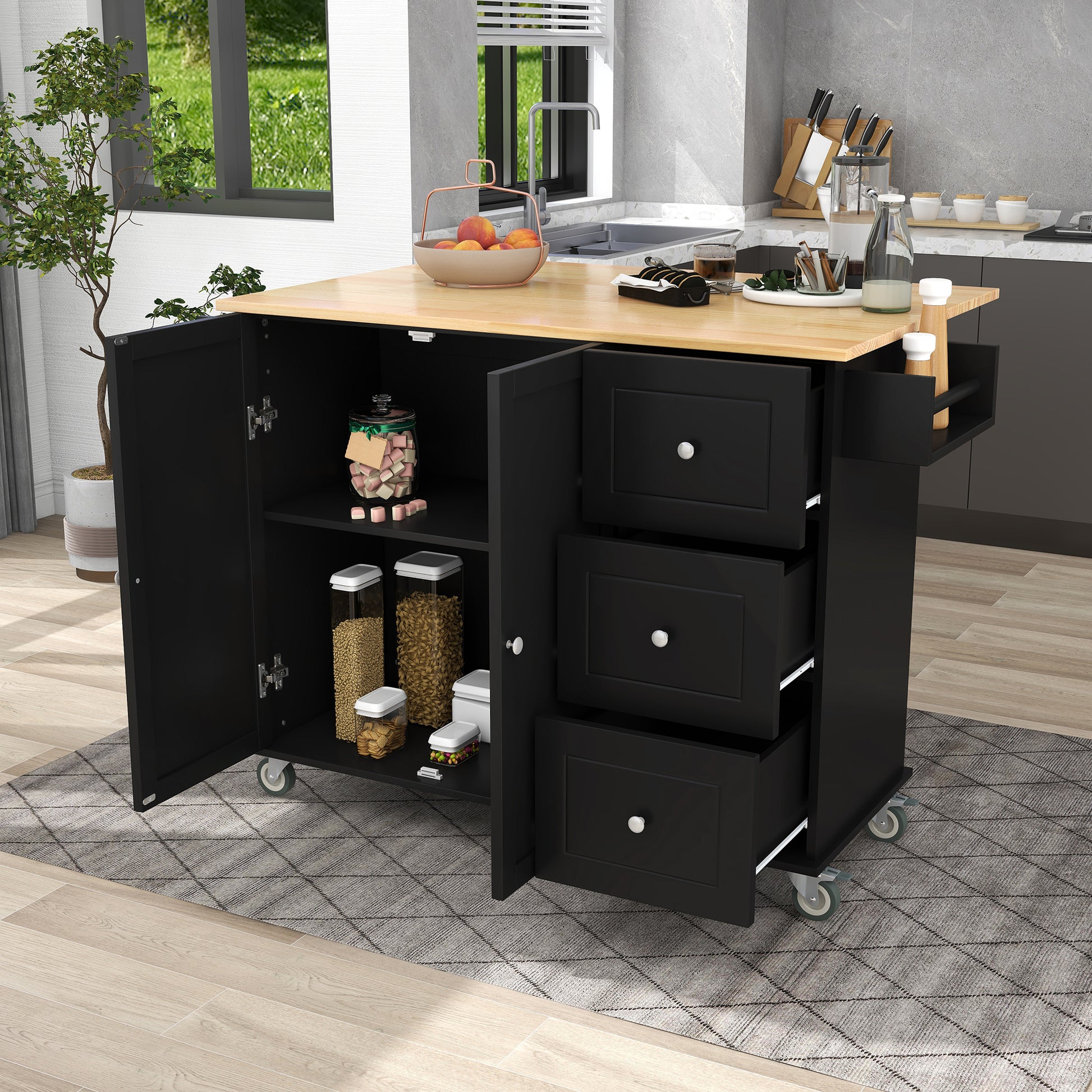 Black kitchen island cart with butcher block top and three drawers