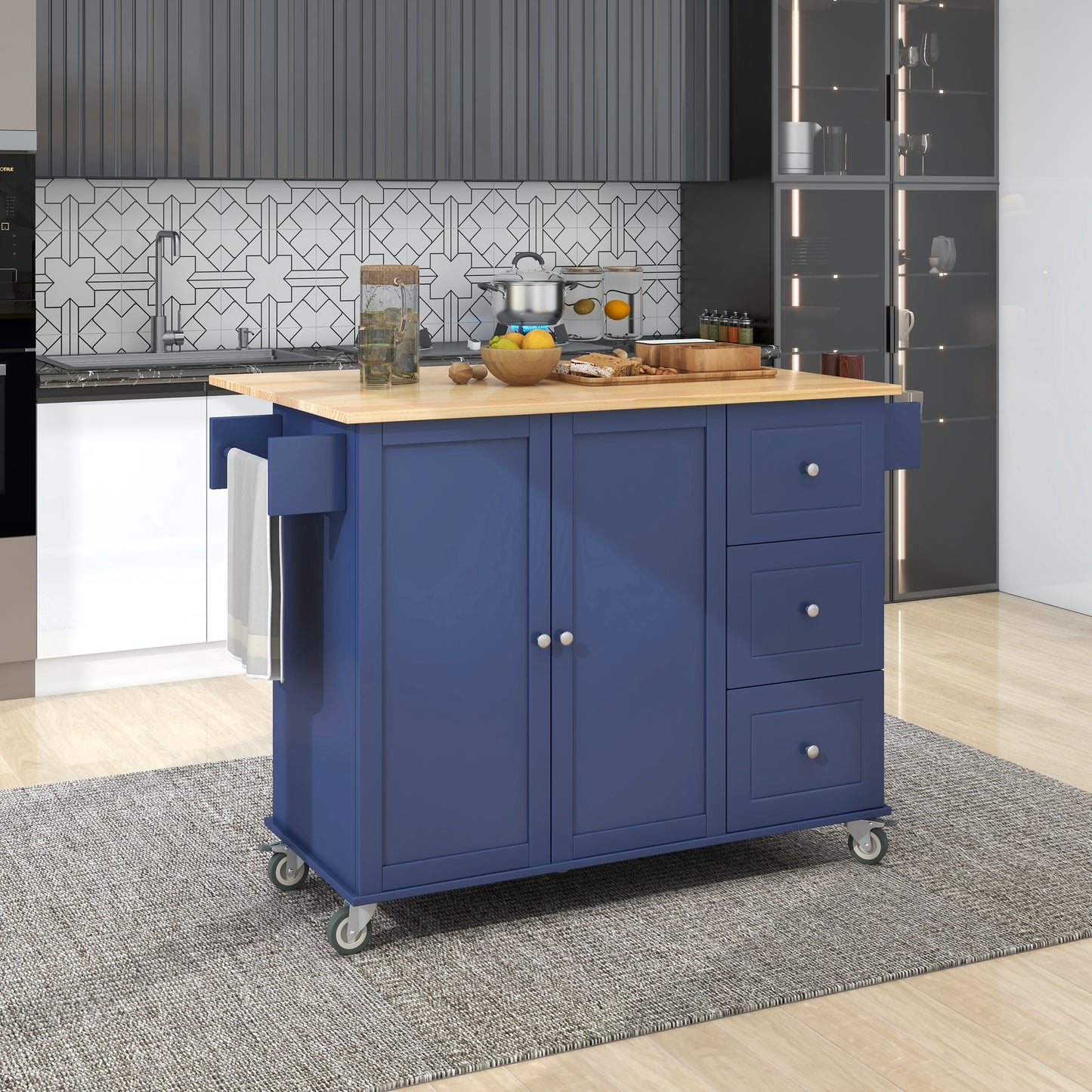 Blue kitchen island with butcher block top and rolling wheels