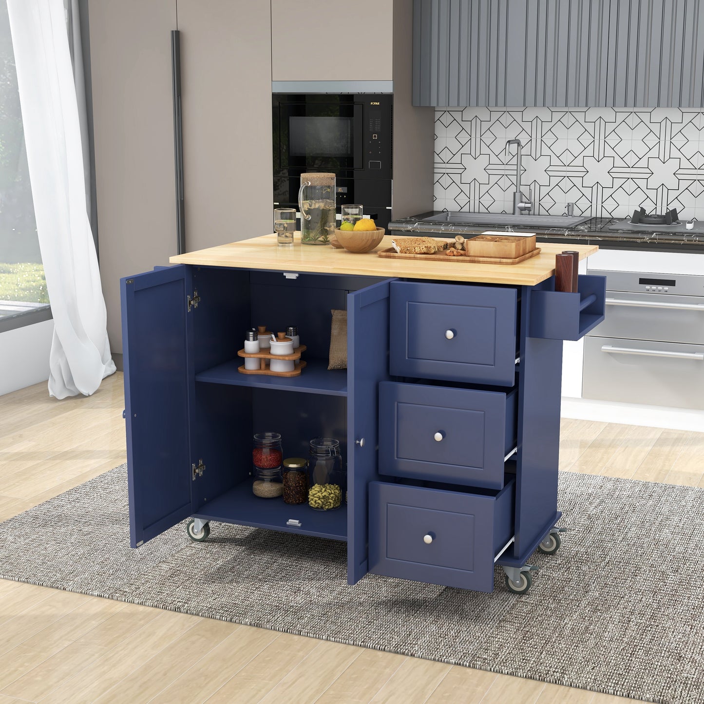 Navy blue kitchen cart with butcher block top and three drawers