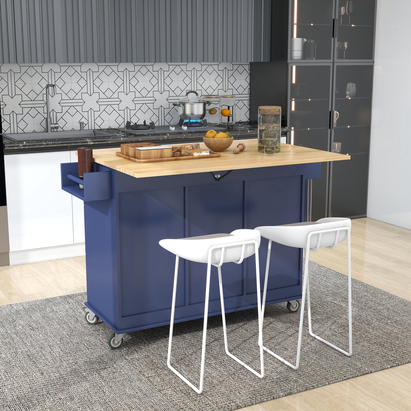 Navy blue kitchen island with butcher block top and two white stools