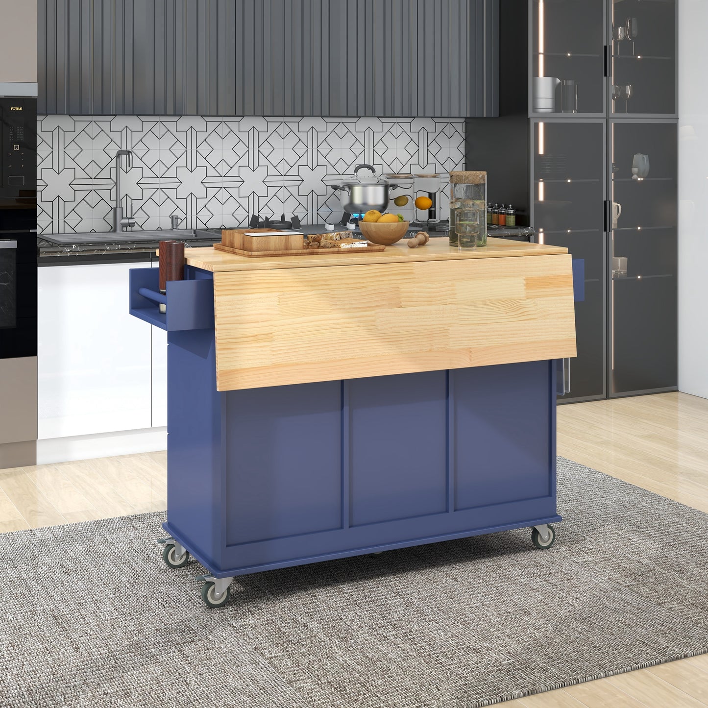 Navy blue kitchen island cart with natural wood drop leaf countertop and wheels