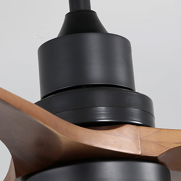Closeup of black motor housing with wood grain fan blades