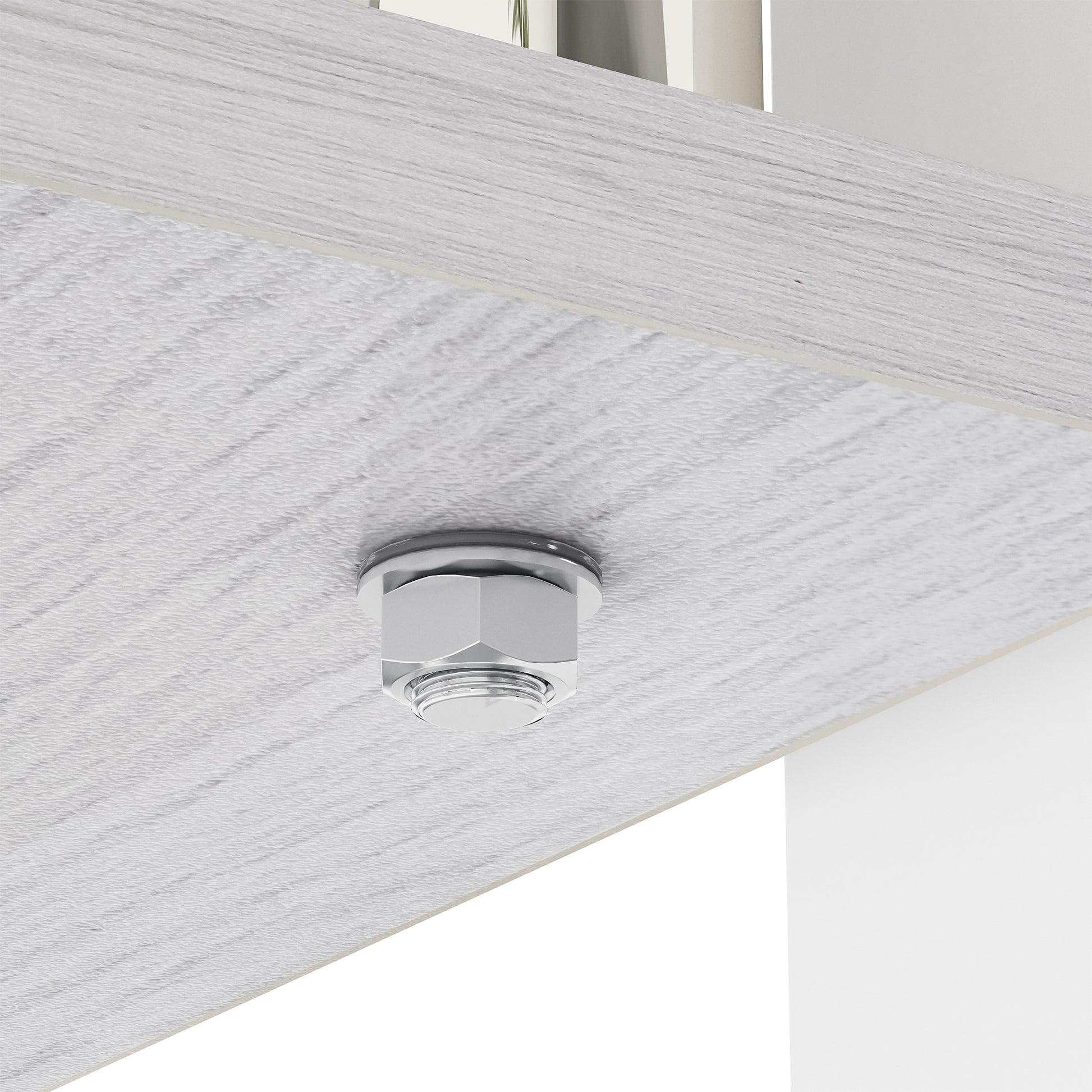 Chrome plated hex bolt and nut securing a light grey wood grain shelf