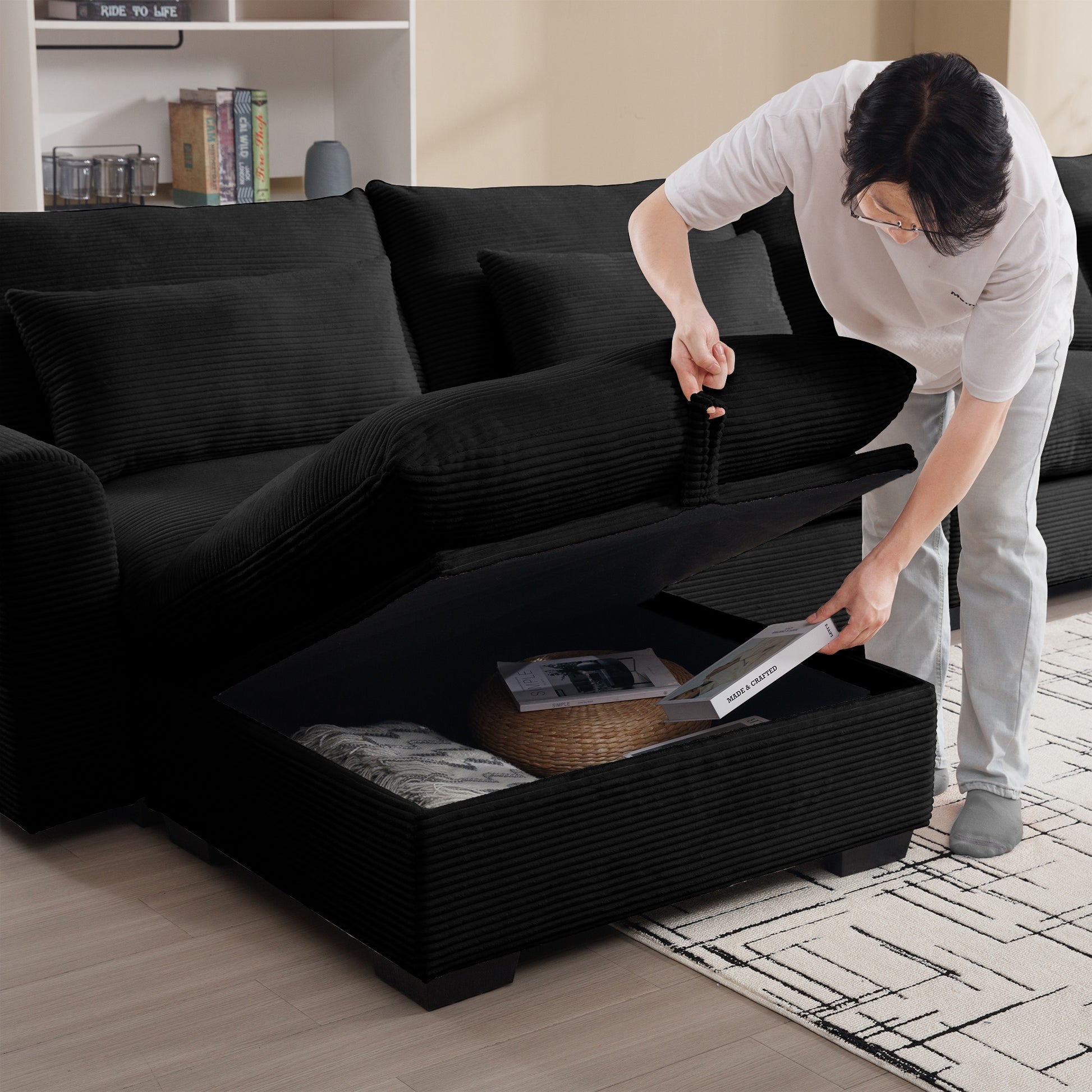 Black corduroy sectional sofa with hidden storage compartment