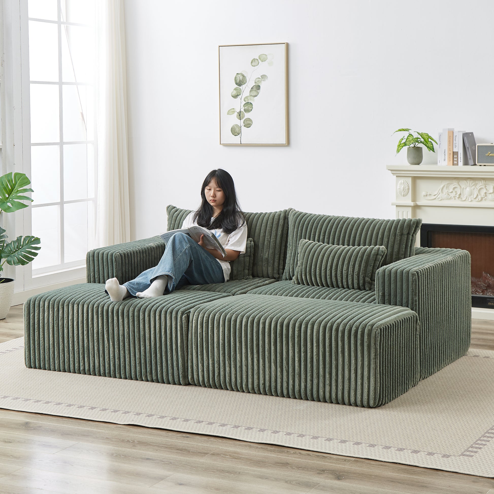 Sage green corduroy sectional sofa with modular ottoman a cozy living room piece