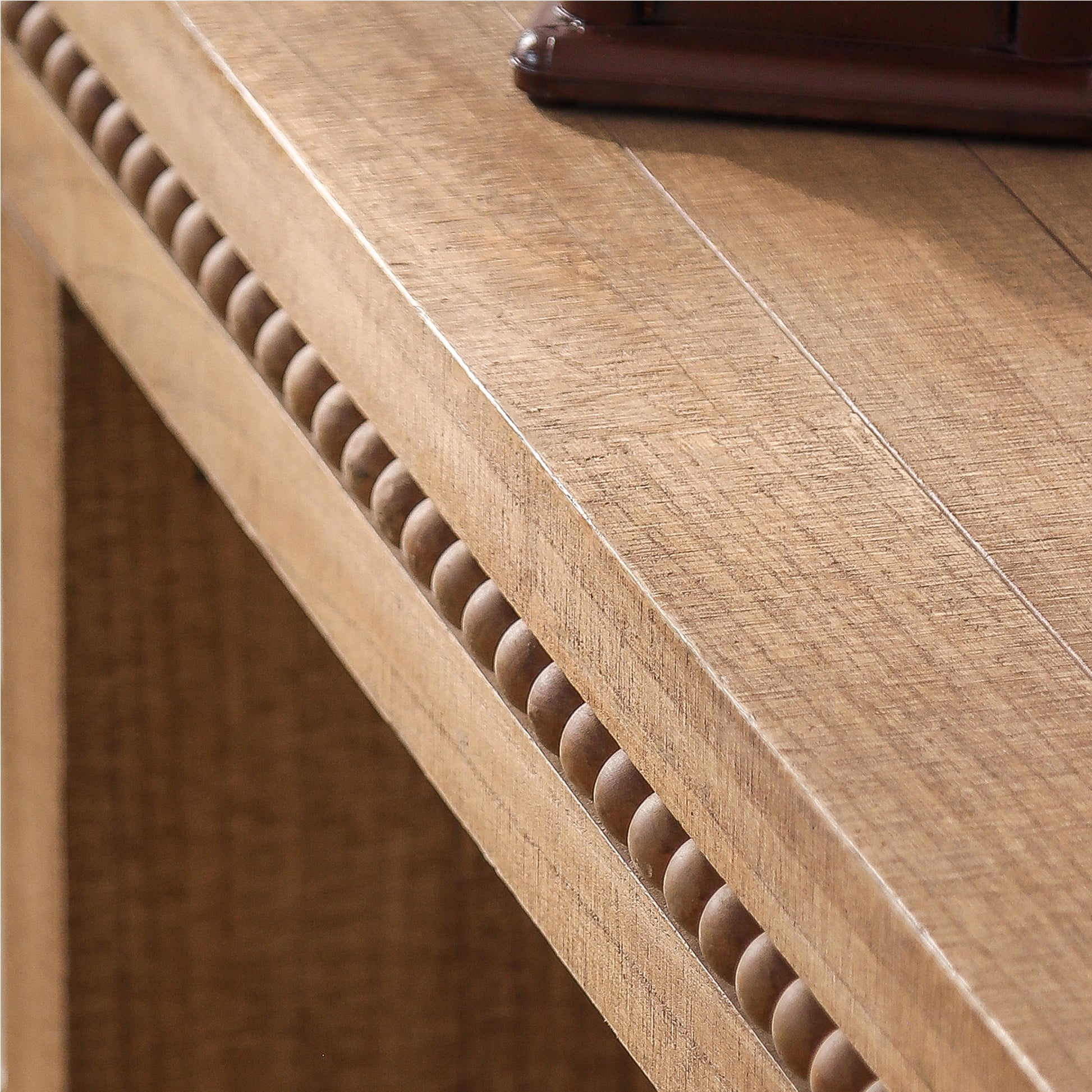 Natural wood table with beaded trim detail perfect for rustic dining rooms