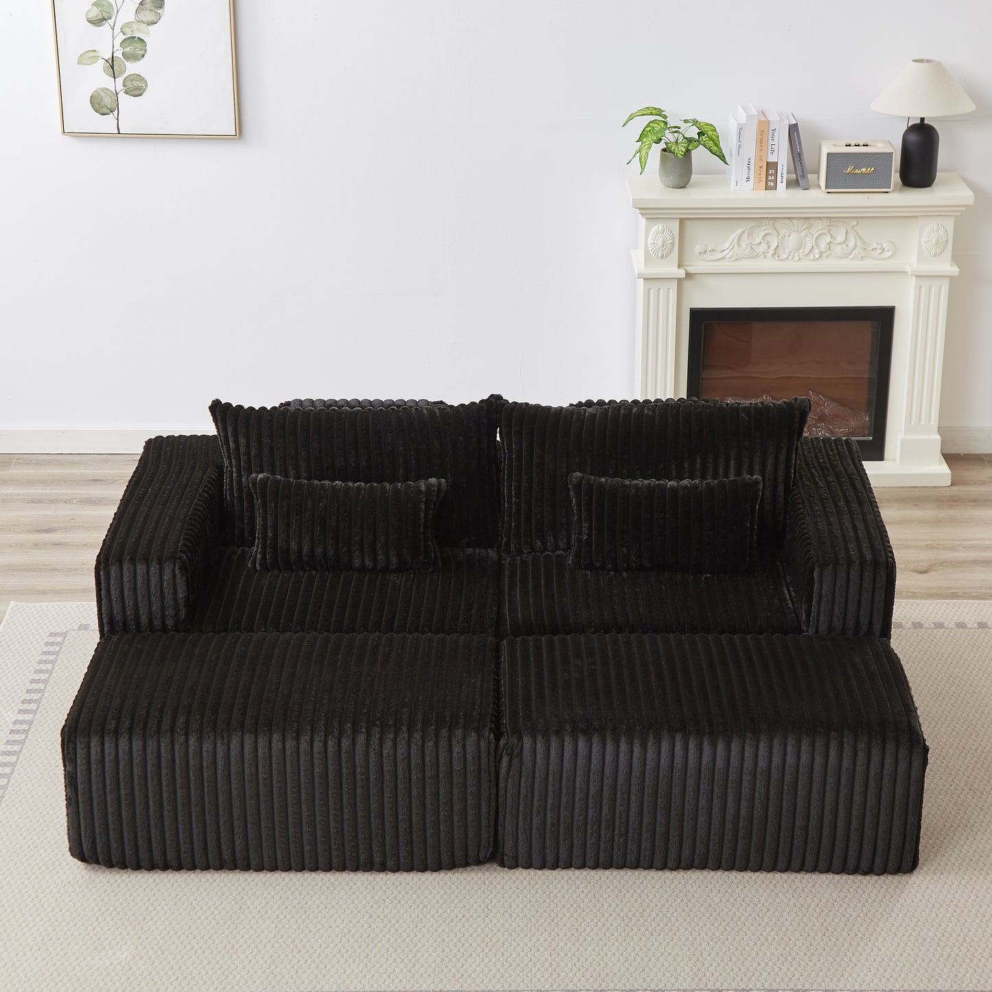 Black corduroy sectional sofa with deep seating and plush cushions