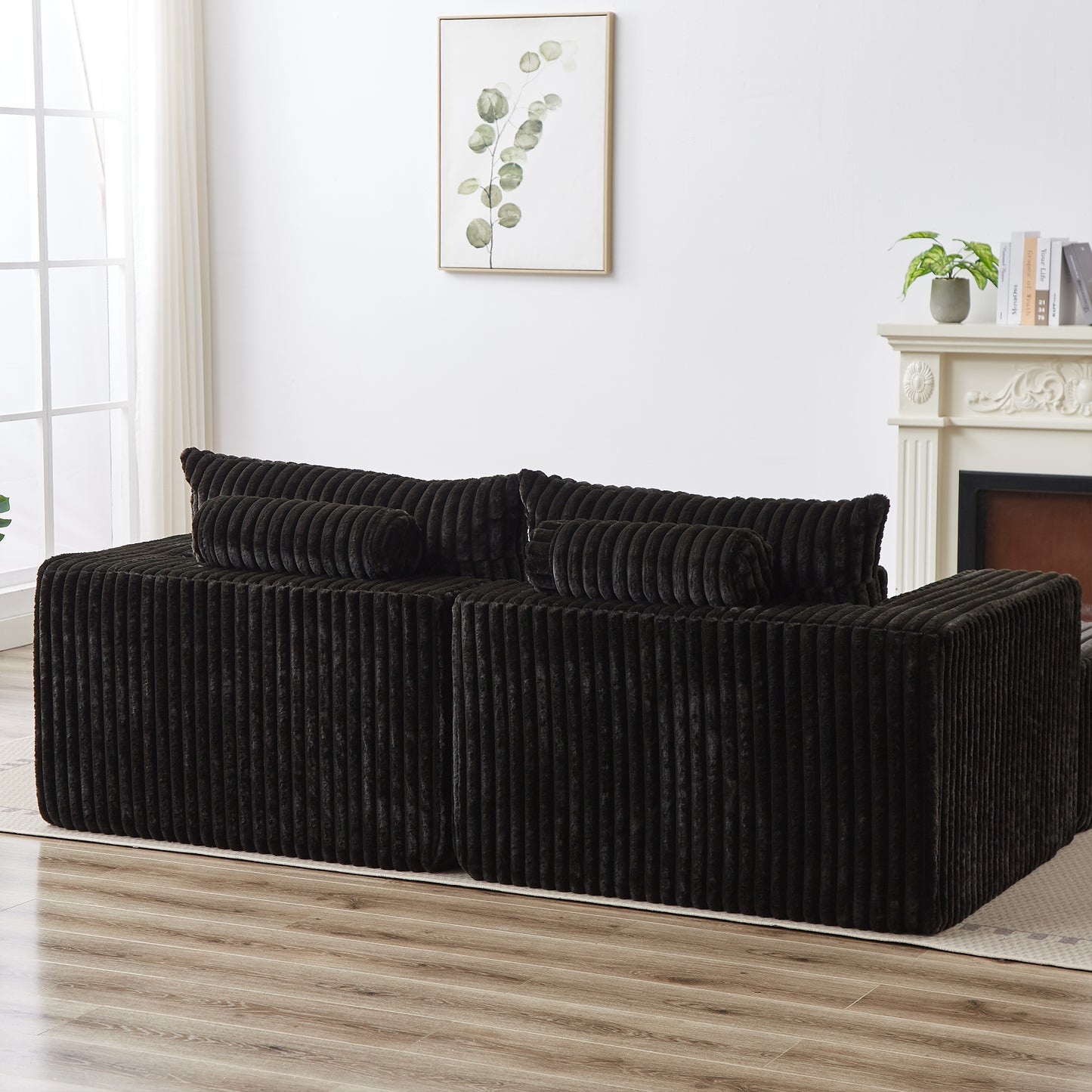 Plush dark brown corduroy sectional sofa with matching bolster pillows for ultimate comfort