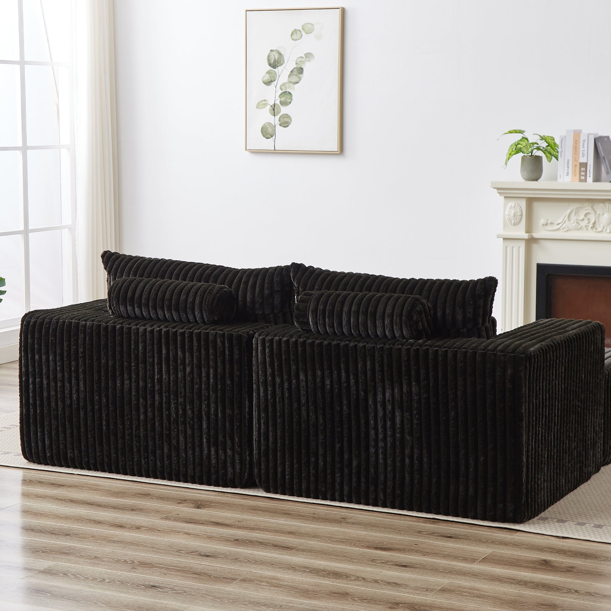 Plush dark brown corduroy sectional sofa with matching bolster pillows for ultimate comfort