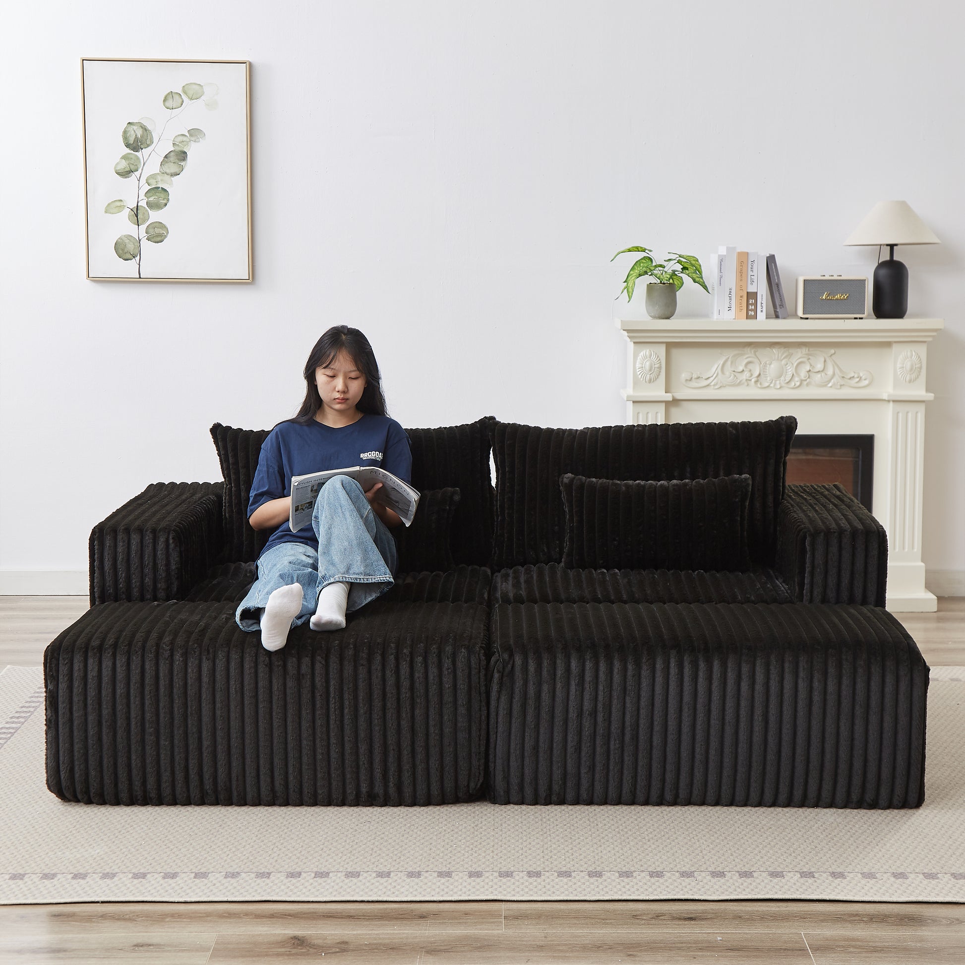Plush black sectional sofa with textured fabric perfect for modern living room comfort
