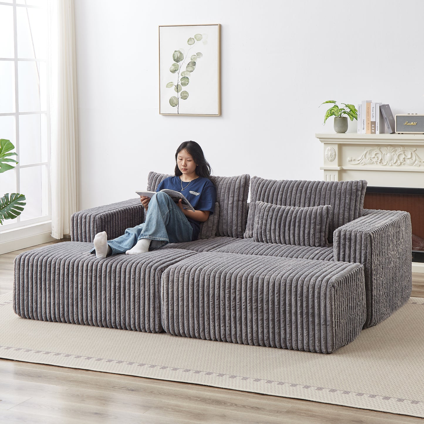 Comfortable grey corduroy sectional sofa with plush cushions and a modern design